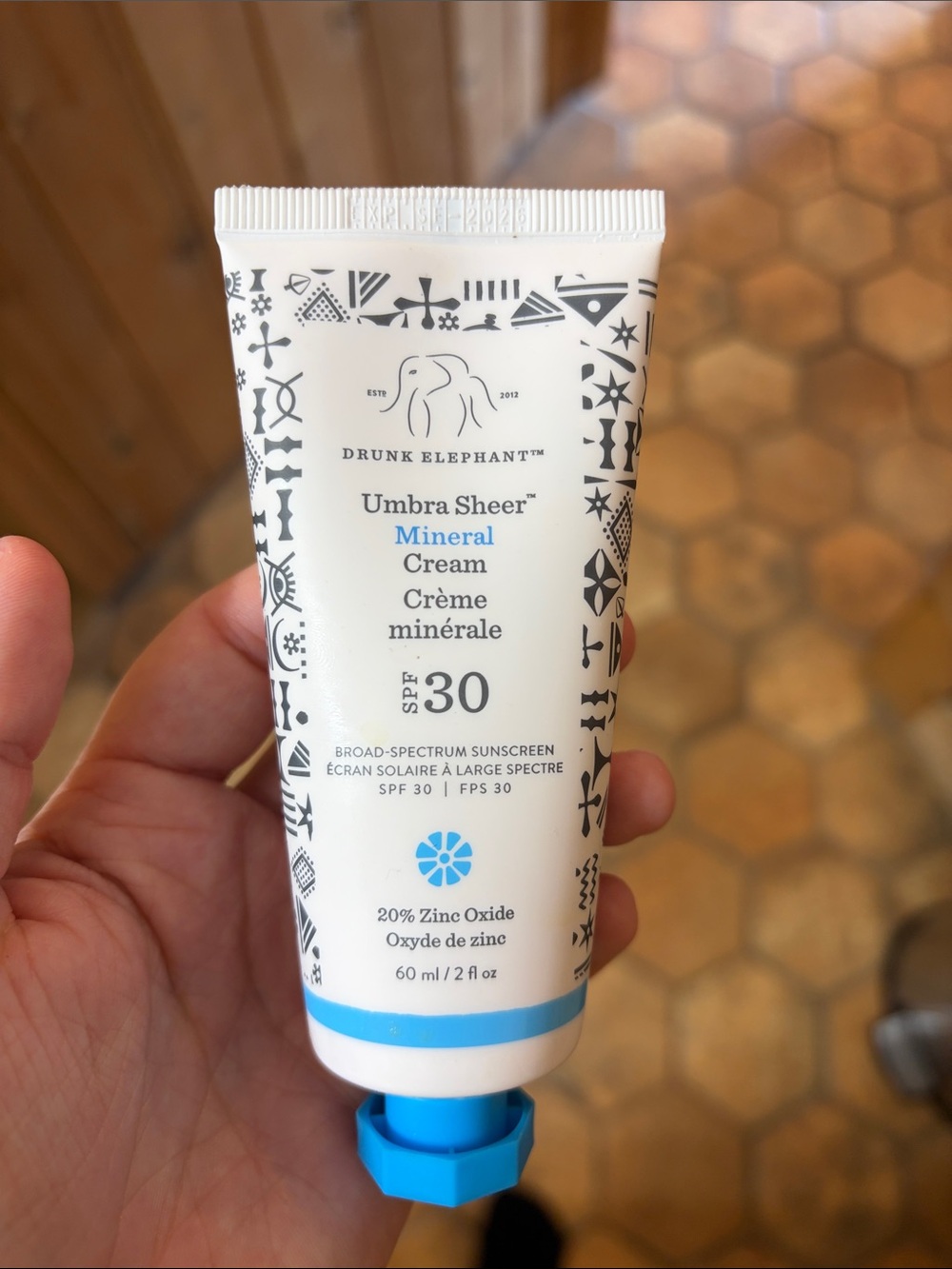 Drunk Elephant Umbra Sheer Mineral Cream SPF 30 — White with Blue Accents